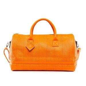 2 piece duffle bag set. Never used. Snake skin texture. Sold as set